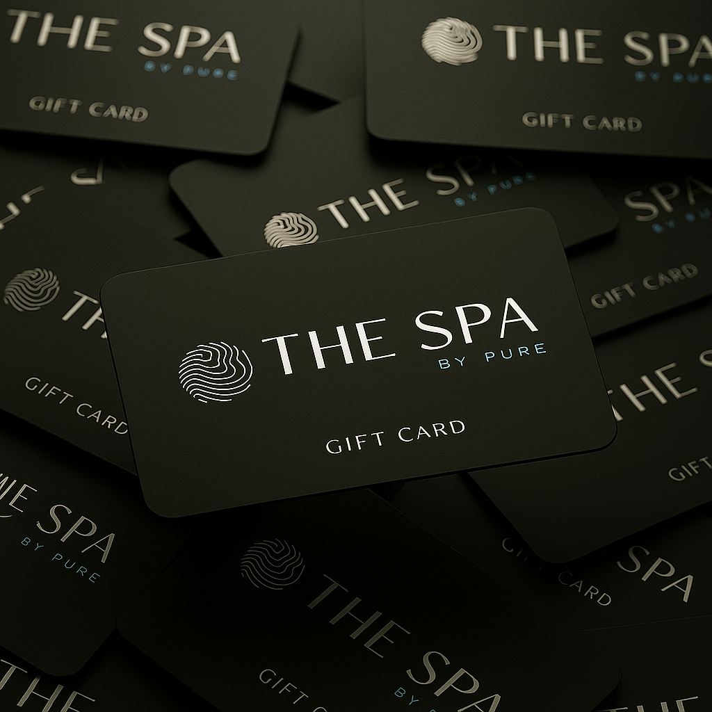 The Spa by Pure elegant gift cards arranged on dark background